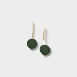 An elegant set of silver earrings with a moss green polymer clay bead